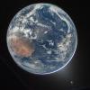 Picture of Earth from the Orion spacecraft's window on April 2, 2026, after completing the translunar injection burn | Image Credit: NASA/Reid Wiseman